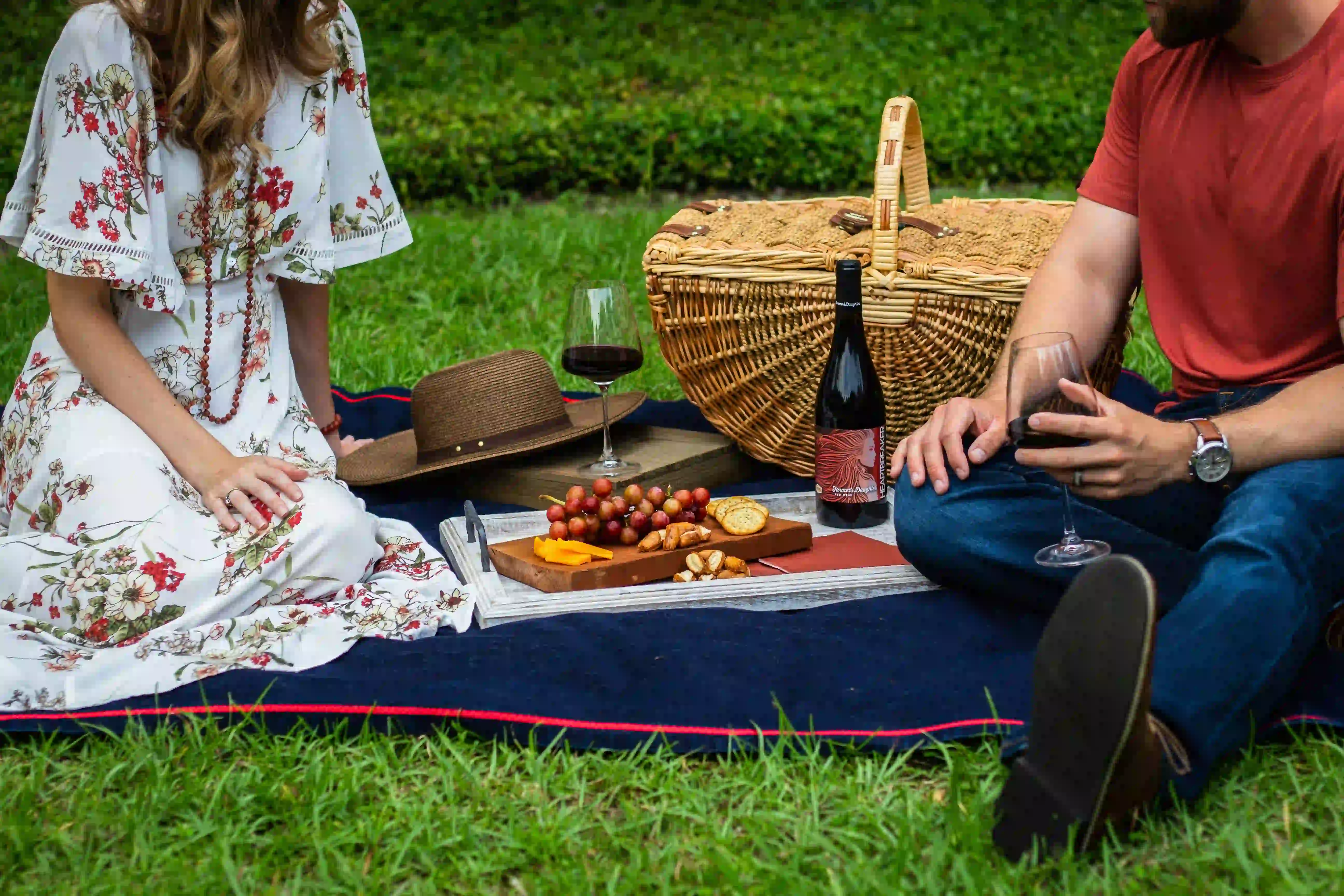 A man and a woman having a picnic