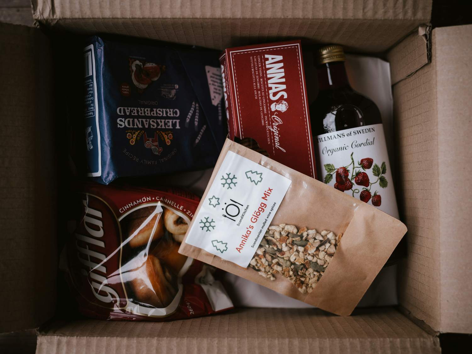 A box filled with long-distance relationship gifts